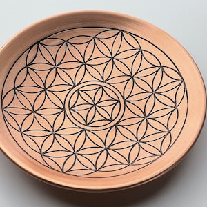 Engraved copper flower-of-life plate/bowl with sacred geometry grid design