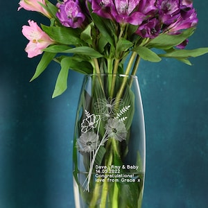 Blue glass bullet vase with white floral engraving and personalization message