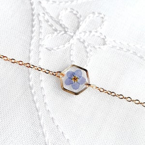 Gold-plated pressed flower bracelet with small hexagon pendant and chain links