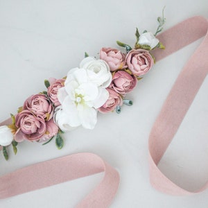 Dusty rose floral belt with pink roses, white blossoms, and green leaves on ribbon