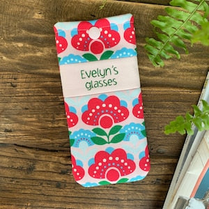 Pink retro floral glasses case with snap closure, Evelyn's Glasses label
