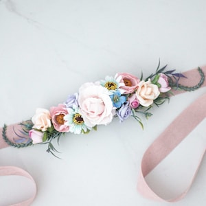 Pastel flower sash belt with large pink, blue, and white blooms