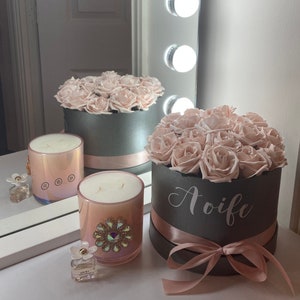Pink rose hatbox with ribbon bow and engraved cursive name, decorative roses inside