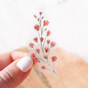 Clear pink star-flower sticker, 2.5x1.25 in