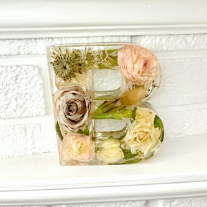 Resin alphabet letter with preserved roses and greenery, cream and peach floral accents