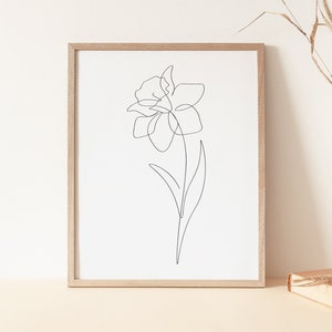 Framed minimalist daffodil line art print with single continuous flower drawing
