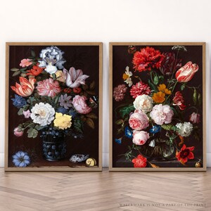 Set of two framed dark floral still-life paintings with vintage bouquet in vases