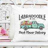 Printable dog flower delivery truck graphic with Labradoodle text and colorful bouquets on teal truck
