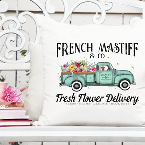 French Mastiff flower delivery truck graphic with green vehicle and floral wreath