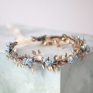 Thin flower crown headband with gold leaves and light blue dried blossoms