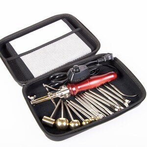 Millinery flower-making tool set in black case, red-handled stamp tool and metal pins