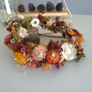 Burnt orange and white dried flower crown wreath with greenery accents
