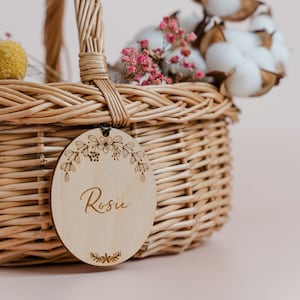 Personalised flower girl basket with woven handle and engraved oval keepsake tag