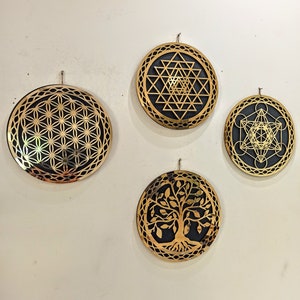 Sacred geometry wooden wall art set of five circular laser-cut mandala plaques