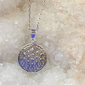 Sterling silver flower of life pendant with blue geometric circle and chain