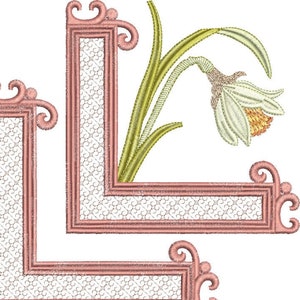Embroidered corner trim with pale pink border and daffodil flower motif