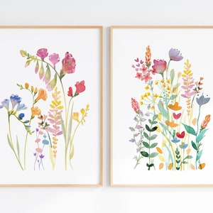 Set of two framed wildflower watercolor wall art prints with colorful floral stems