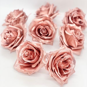 Metallic rose gold flower cake topper, five rose-shaped decorative blooms
