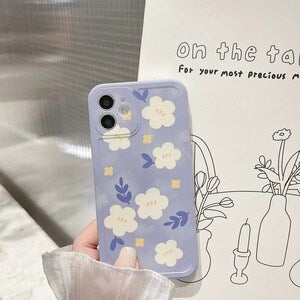 Purple and white floral iPhone phone case with white flowers and yellow centers