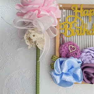 Decorative ribbon flower ballpoint pen with pink and cream flower topper
