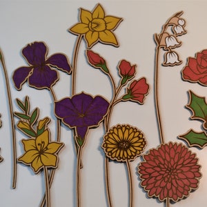 Wooden birth month flower set with colorful engraved blossoms on thin stems