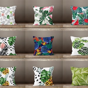 Decorative cushion cover with multicolor tropical leaf and flower pattern, square