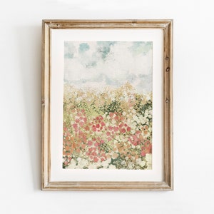 Framed floral landscape print with meadow flowers and soft sky background