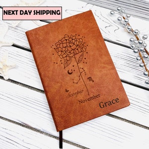 Birth flower journal with engraved floral design, plus “Grace” and “November” on brown cover