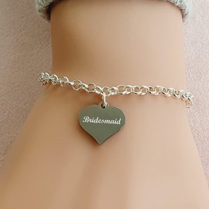 Silver heart charm link bracelet with engraved "Bridesmaid" pendant