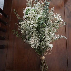 Dried baby's breath and eucalyptus bridal bouquet with tied stems
