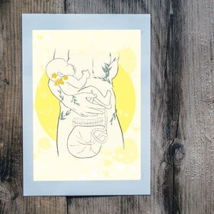 Nursery wall art print with mother breastfeeding a newborn, yellow line illustration