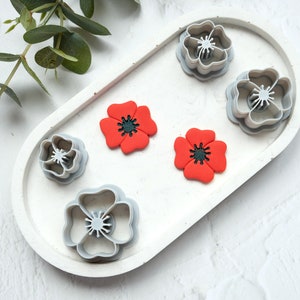 Poppy flower polymer clay cutter set with embossed flower cutters and red clay flowers