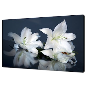 White lily floral canvas wall art with five white blooms and green stems