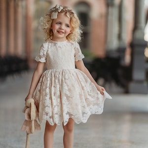 Ivory lace bodice short-sleeve flower girl dress with gathered tulle skirt