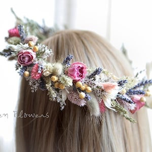 Dried flower hair crown with blush pink and lavender blooms on a hair model