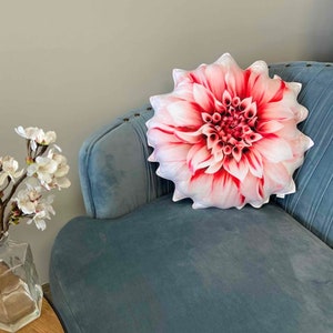 Dahlia flower pillow with pink and white layered petals, plush flower design