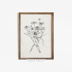 Framed wildflower sketch print with bouquet in black ink, simple wooden frame