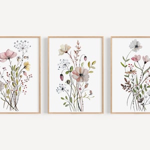 Set of three floral botanical wall art prints in wooden frames, watercolor wildflowers