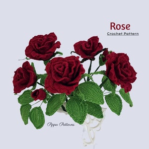 Crochet rose flower pattern with five dark red roses and green leaves and stems
