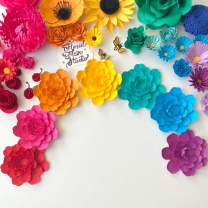 Rainbow mini paper flower garland wreath made of layered paper blooms