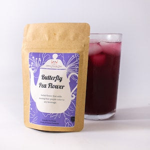 Loose leaf butterfly pea flower tea in kraft paper pouch with purple label