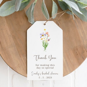 White hexagon thank you shower favor tag with small wildflower illustration