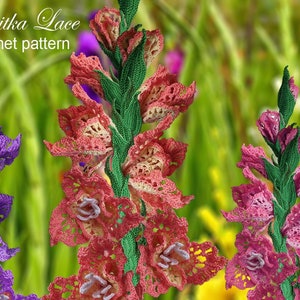 Crochet gladiolus flowers with pink-red petals and green leaves