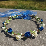 Blue and ivory flower crown headband with small blooms and green leaves, beaded wreath