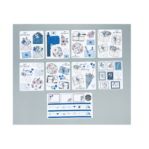 Planner sticker sheet with assorted parcel and delivery themed stickers, blue and white