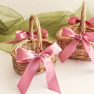 Child flower girl basket set of two with pink satin ribbon bows and braided handles