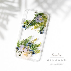 Floral pressed-flower phone case with clear edges and botanical bouquet design