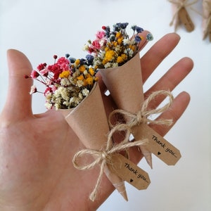 Mini dried flower bouquet favor in kraft wrap with twine and small thank-you tags