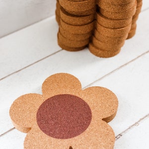 Flower-shaped natural cork coaster with non-slip backing