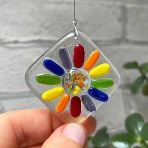 Fused glass rainbow flower pendant with silver hanging loop, handmade keepsake